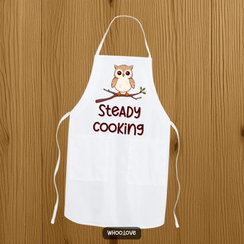 Funny kitchen apron featuring a determined small owl character balancing on a wobbly branch.