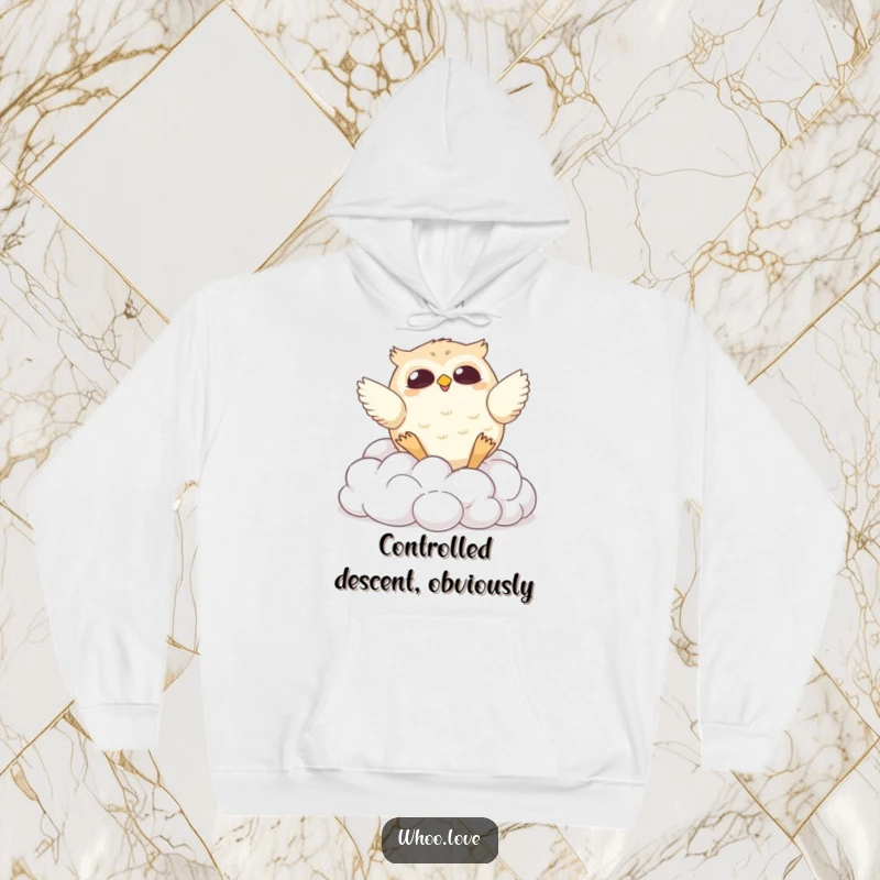 Funny hoodie showing a chubby owl hilariously tumbling down cotton-soft clouds, perfect for cozying up with a laugh.