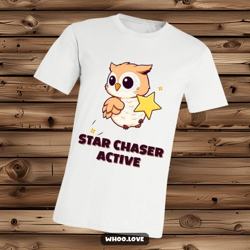 Funny t-shirt showing a playful owl in hot pursuit of a sparkling, whimsical little star, embodying fun and aspiration.
